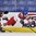 PLYMOUTH, MICHIGAN - APRIL 4: Czech Republic's Aneta Tejralova #2 is tripped by Switzerland's Laura Benz #21 during relegation round action at the 2017 IIHF Ice Hockey Women's World Championship. (Photo by Minas Panagiotakis/HHOF-IIHF Images)